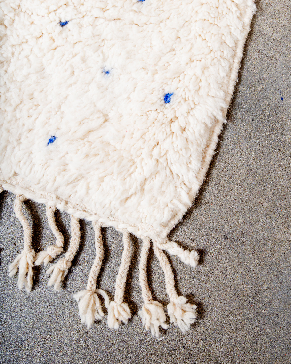 Modern, designer, handcrafted Berber rug from Morocco. Beniourain carpet with beautiful colours and patterns and fluffy wool texture.